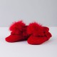 Red moccasins with pom-pom